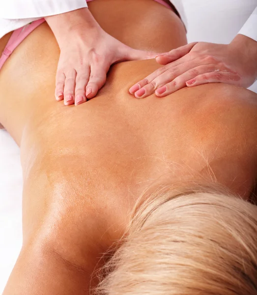 Massage of female back.