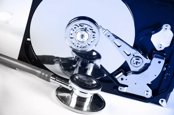 Computer hard drive and a stethoscope