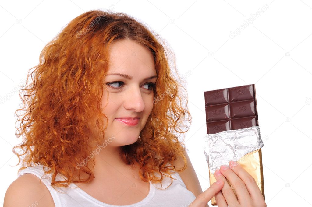 Young redhead pregnant mom thinks about chocolate