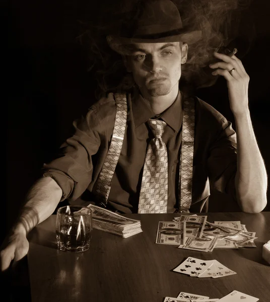 Man playng card game