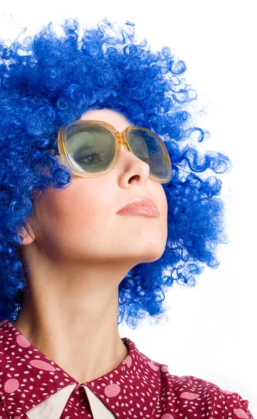 Happy woman in blue wig