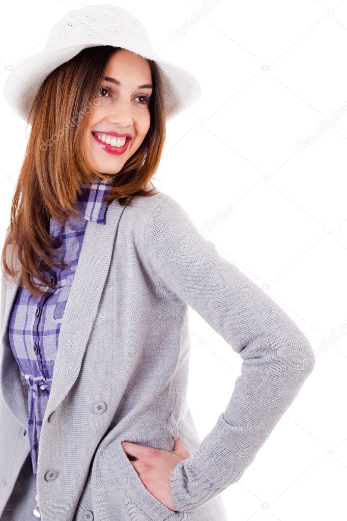 Side pose of a young model smiling on a white background