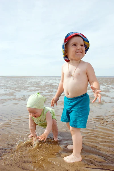 Kids playing at the beach Sea — Stock Photo #2868915