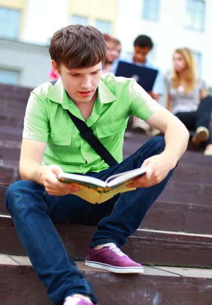 Young man read book — Stock Photo #4262825