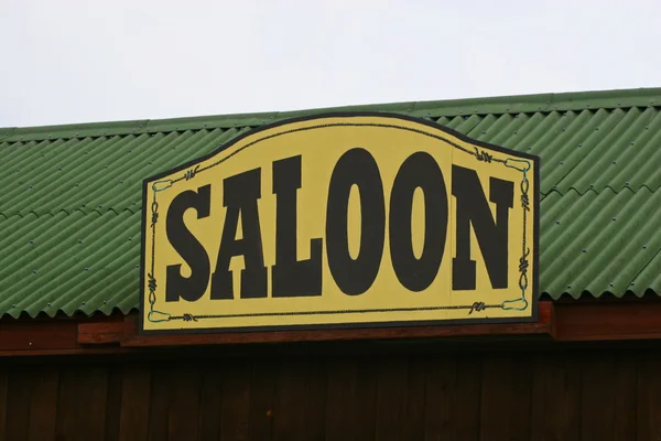 Old Saloon Sign on Weathered — Stock Photo #3314548