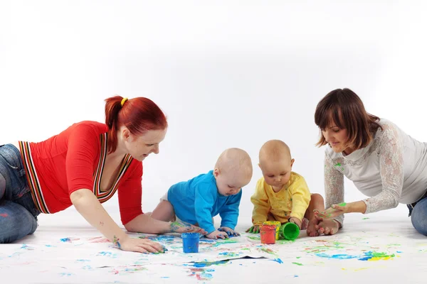 Babies painting with parents