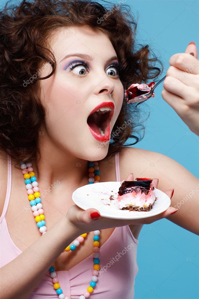 Girl eating cake — Stock Photo © zastavkin 3493937