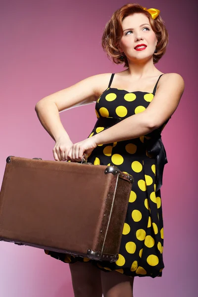 Pin-up girl with luggage — Stock Photo #4202335