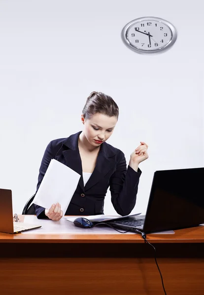 Businesswoman with two laptops