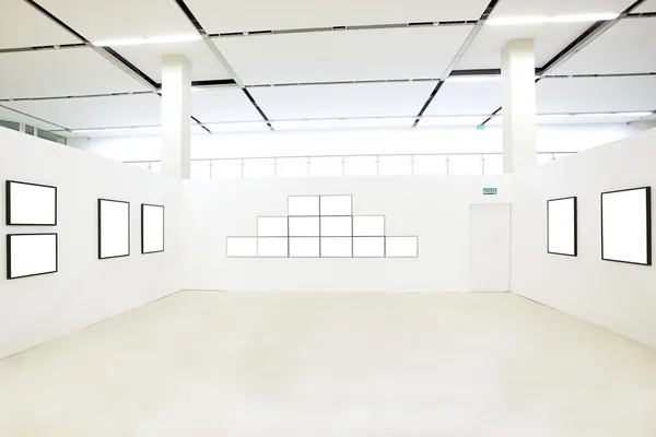 Many empty frames in museum