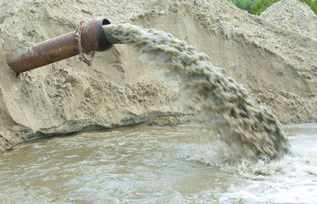 Dirty water flows from a pipe. — Stock Photo © kotomiti 2960195