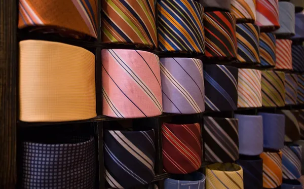 Elegant italian neckties in a tie rack