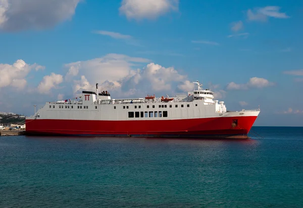 Red passenger ship in the port