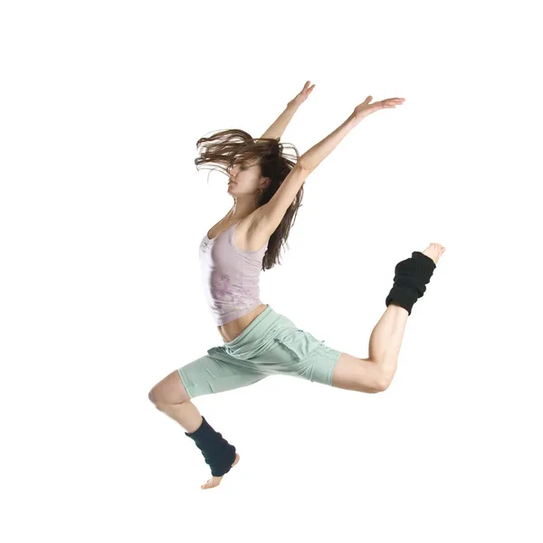Jumping young dancer isolated on white background by artjazz - Stock Photo