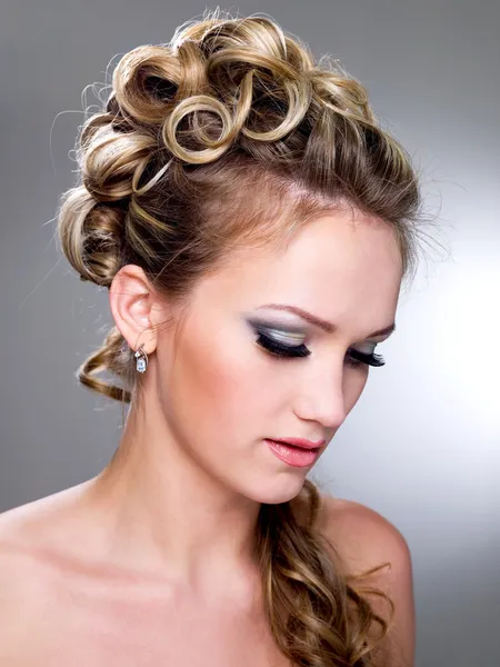 Fashion wedding hairstyle by Vitaly Valua Stock Photo Editorial Use Only