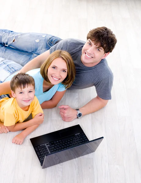 High-angle portait of family with laptop