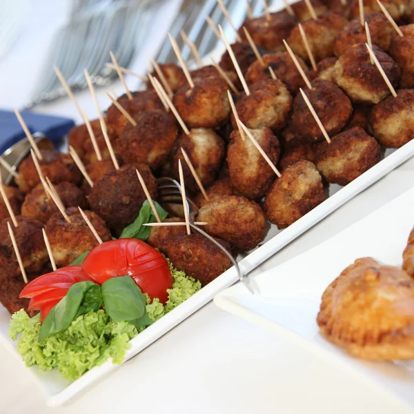Buffet with meatballs as finger food