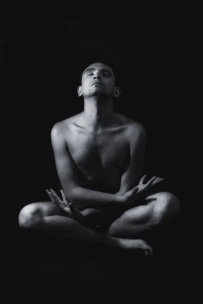 Meditation young naked man