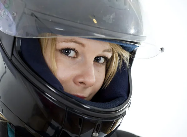 Young woman in a motorcycle helmet