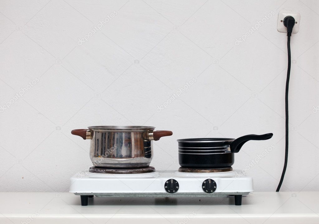 Two pots on electric stove — Stock Photo © photomak 3216144