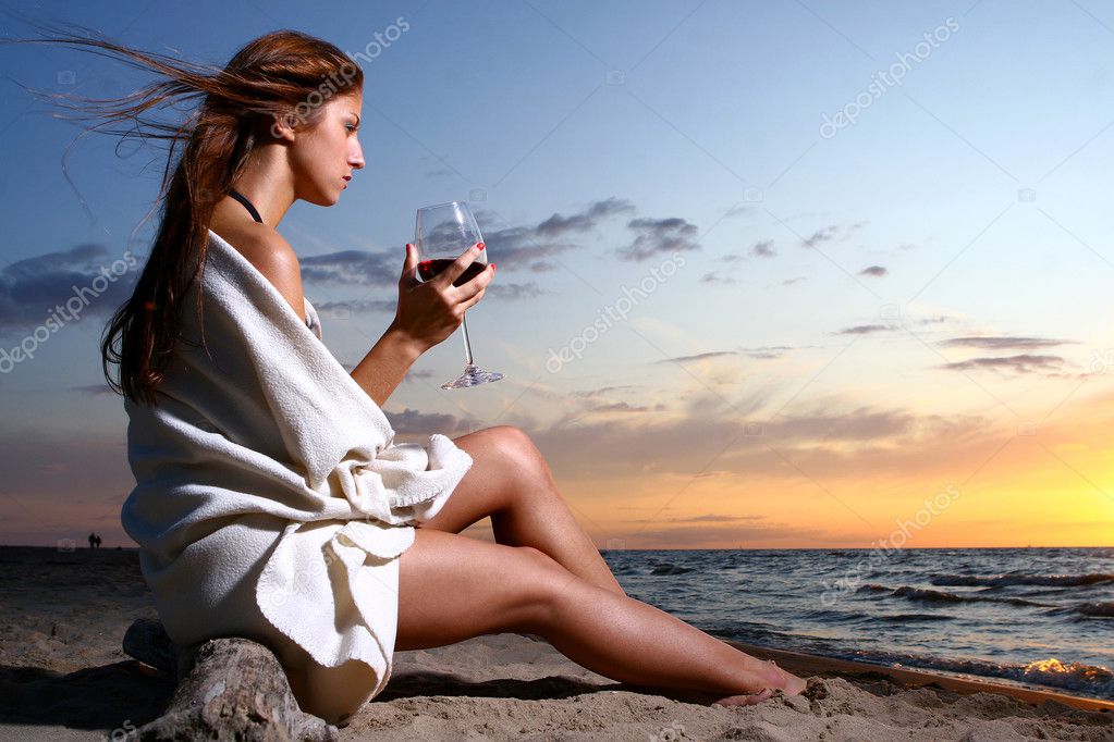 http://static4.depositphotos.com/1003591/382/i/950/depositphotos_3827338-Beautyful-young-woman-drinking-wine-on-the-beach.jpg