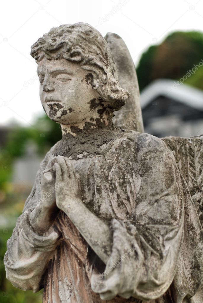 Angel statue in a graveyard