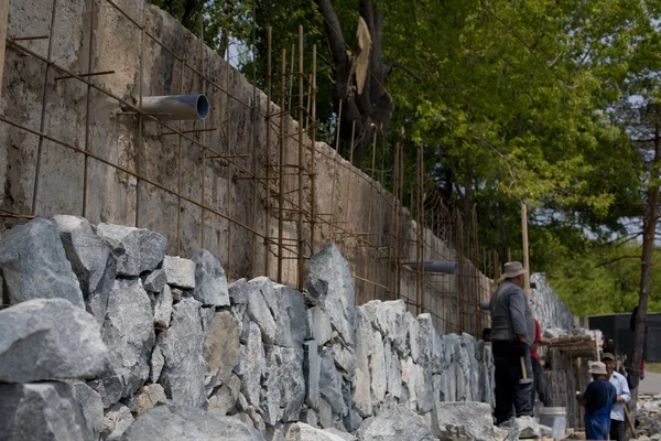 Construction wall of natural stone