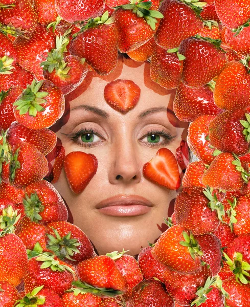 Portrait of young woman, laying under strawberry