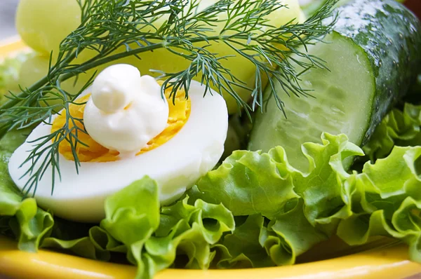 Greens, egg with mayonnaise