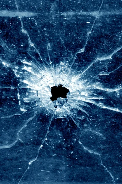 Window bullet hole