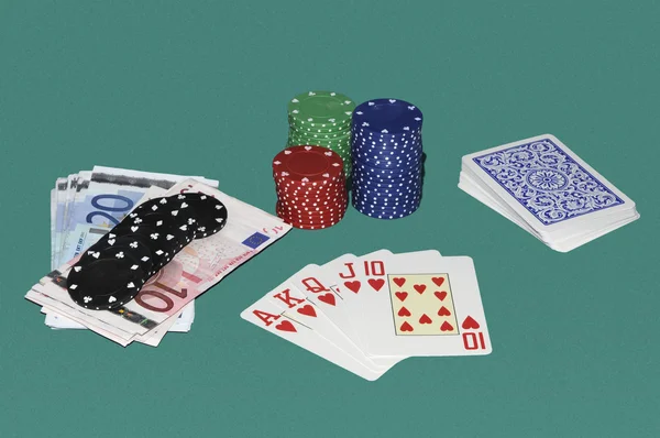Poker gaming table with cards and bets