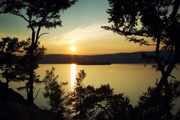 Night landscape against a decline lake Baikal