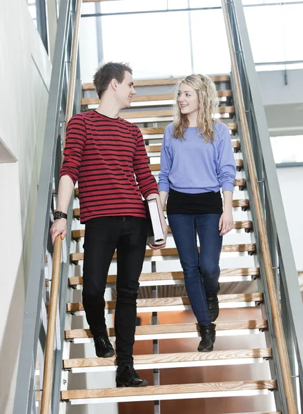 Couple walk the stairs