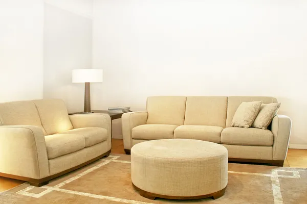 Two beige sofas
