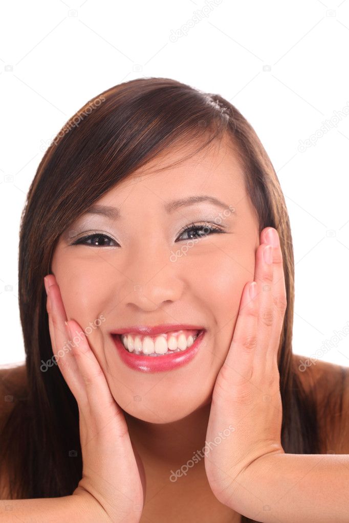 Portrait young asian teen girl with big smile and hands on cheeks