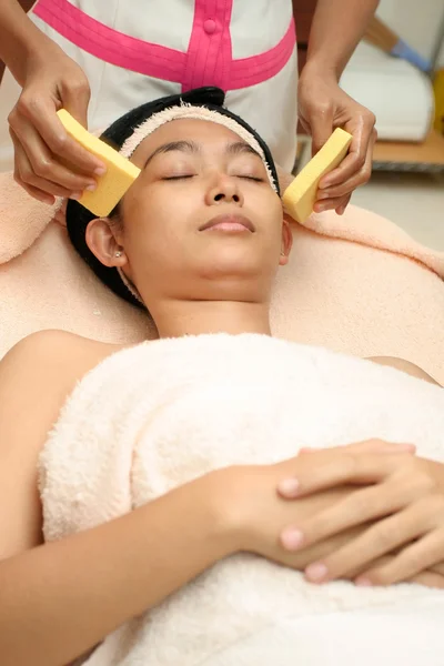 Woman in facial treatment
