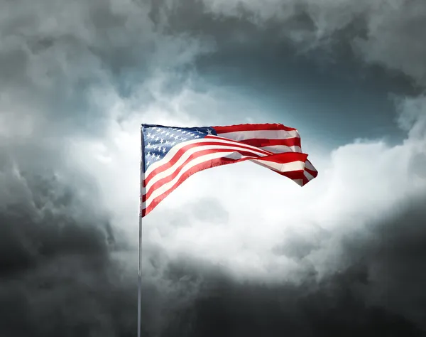 American flag on a cloudy dramatic sky