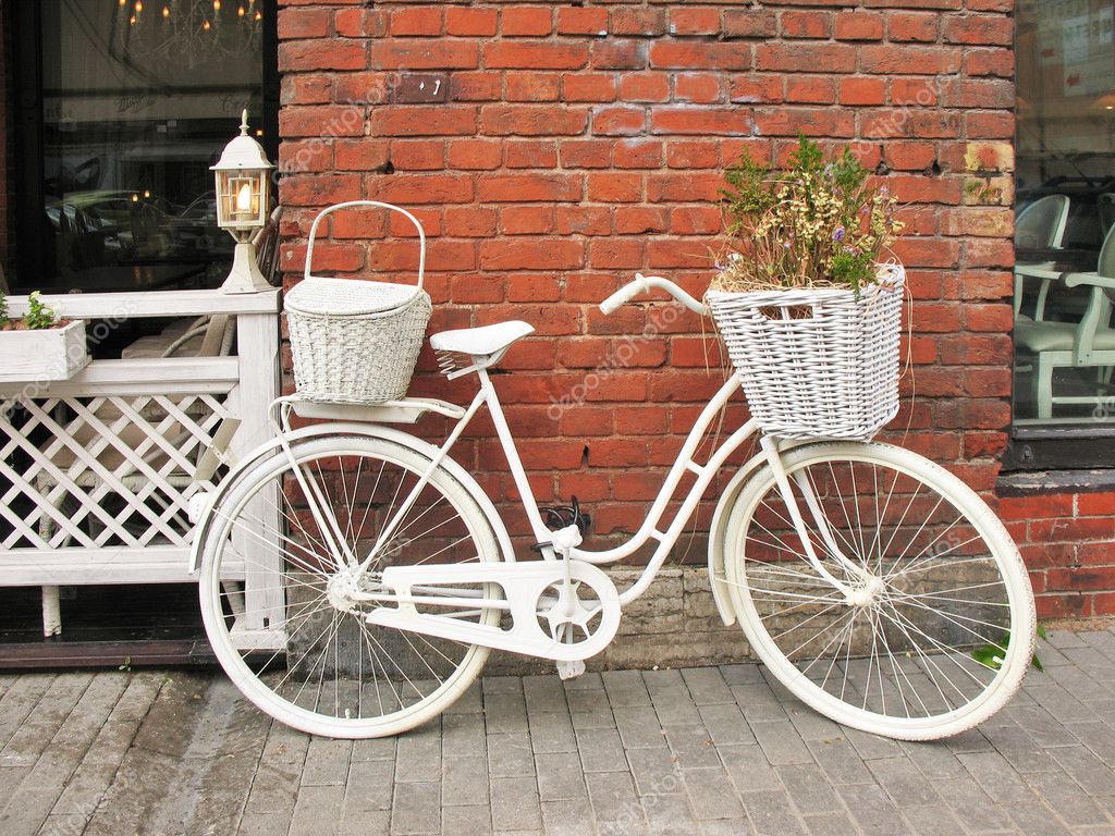 http://static4.depositphotos.com/1006475/383/i/950/depositphotos_3837177-Detail-design-summer-cafe-with-a-bicycle-painted-white.jpg