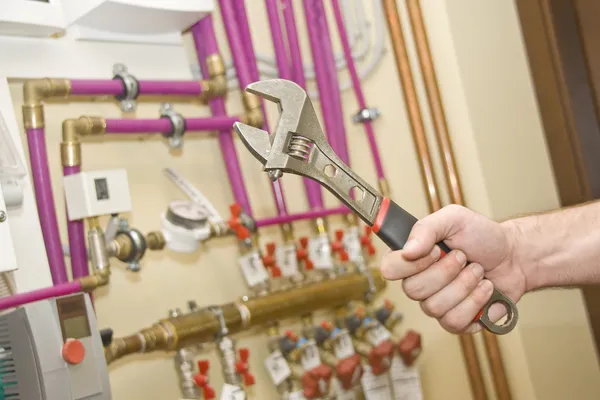 Servicing heating and water systems