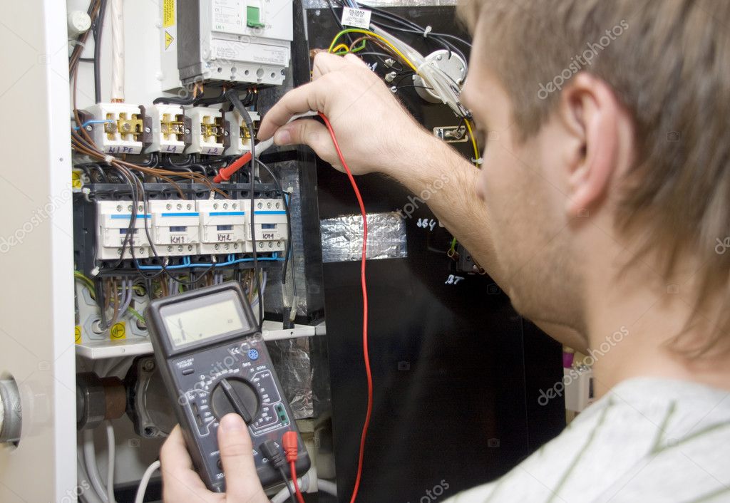 http://static4.depositphotos.com/1006542/306/i/950/depositphotos_3061352-Electrician-at-work.jpg