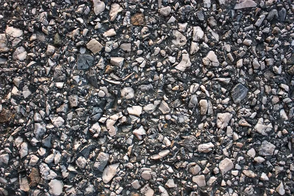Road surface of crushed stone marble