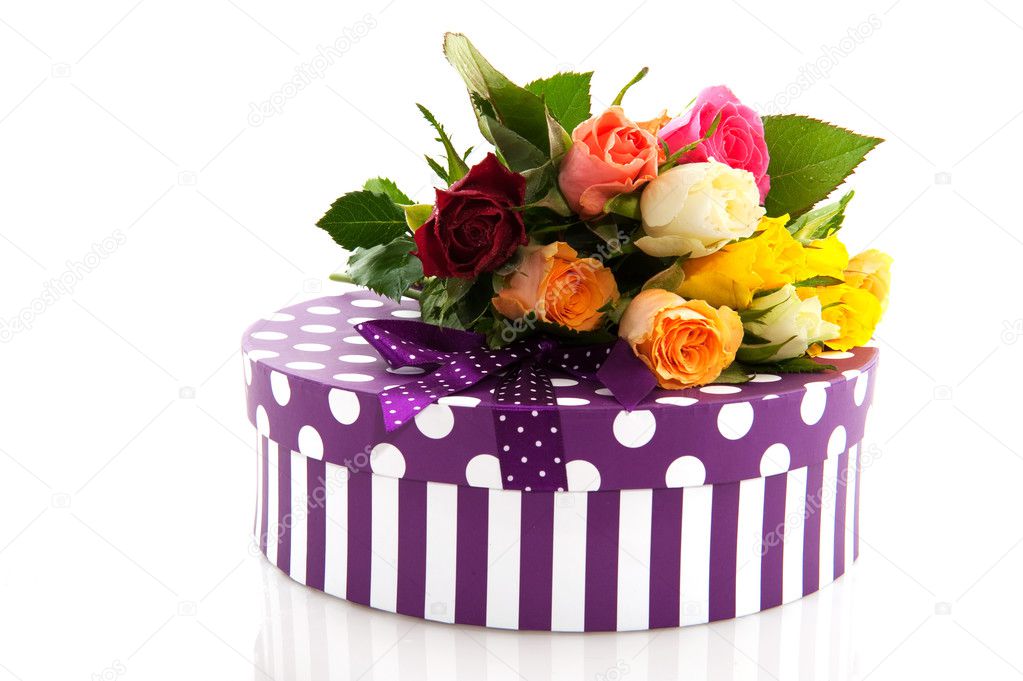 http://static4.depositphotos.com/1007162/314/i/950/depositphotos_3143964-Colorful-roses-and-birthday-present.jpg