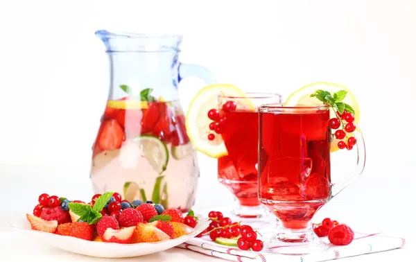 Refreshing summer ice tea with fresh fruits