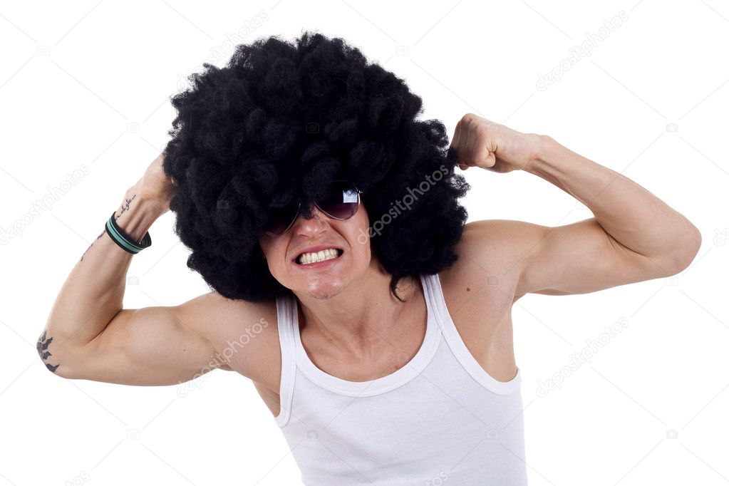 Young funky man flexing his muscles on a white background Young funky man flexing his muscles on a white background