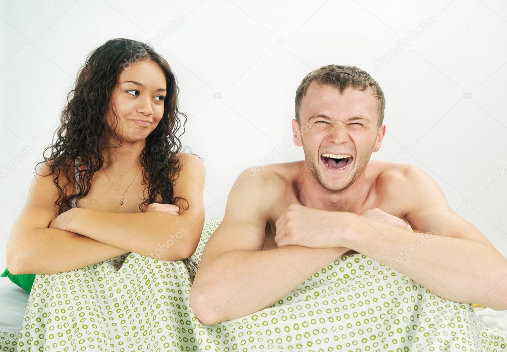 couple in bed at home