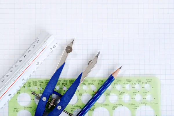 Drafting tools on graph paper