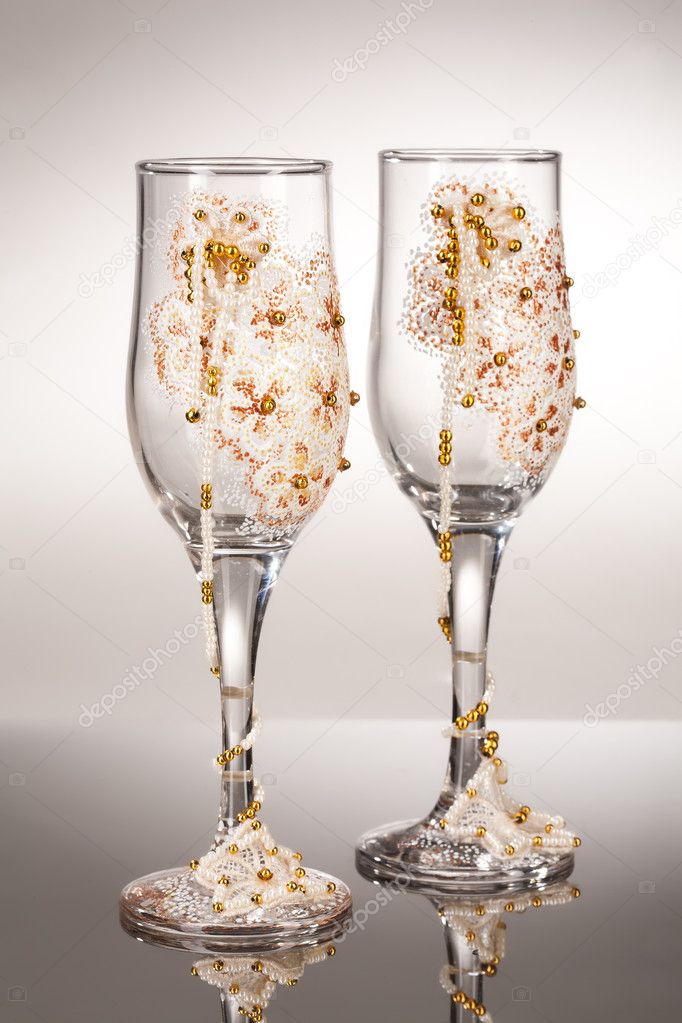 Two decorated glasseson isolated background