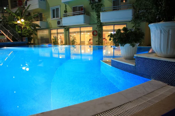 Blue swimming pool.