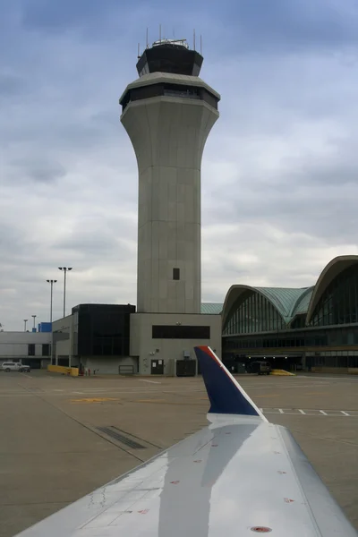 Air traffic control tower with the wing