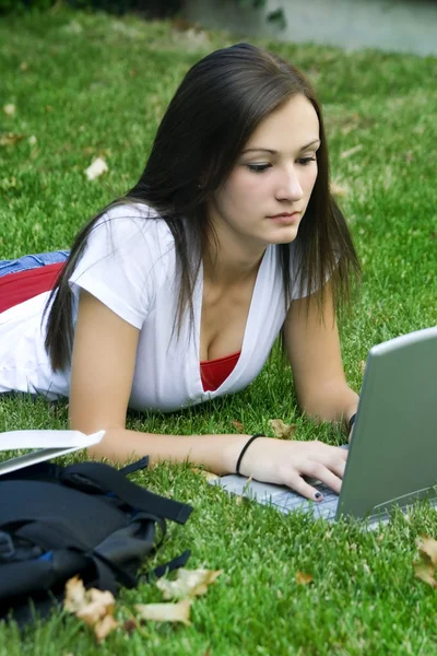 Cute teen girl laying down by Mehmet Dilsiz Stock Photo Editorial Use Only